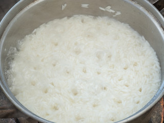 Boil white rice in cooker