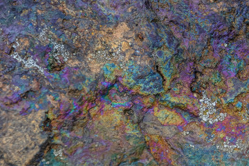 Fototapeta na wymiar Rock detail with variety of pigmentations of different minerals
