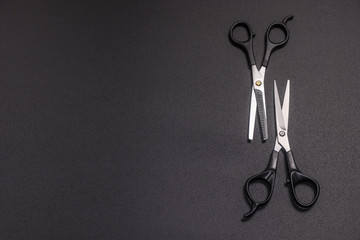 scissors for cutting hair on a black background