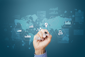 Applications icons and graphs on virtual screen. Business, internet and technology concept.