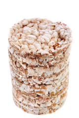 Round wheat crispbread, white background. Composition of crispbread on white background.