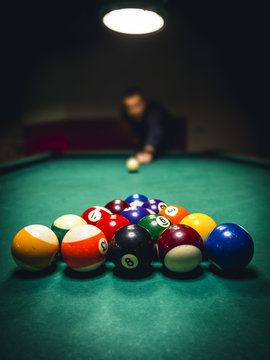 Man playing billiards