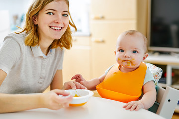 Obraz na płótnie Canvas Mother and baby boy during feeding