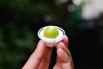 Close up Homemade   Steamed Flour with Coconut Filling little cup. (selective Focus)