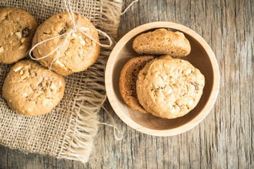 Top view and overhead shot of cookies on old wooden background,Homemade cookies on sackcloth