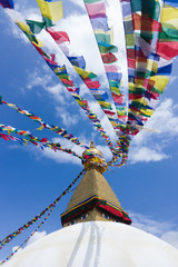 The dome of the Boudhanath Stupa, with prayer flags, Kathmandu, Nepal