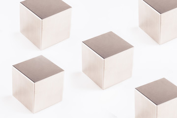 Metal grey cube on a white background ,abstract geometric shape 