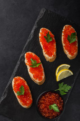 toasts with  red caviar,