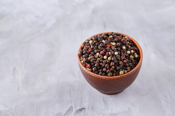 Fototapeta na wymiar Seasoning - four kinds of pepper peas - isolated on white background