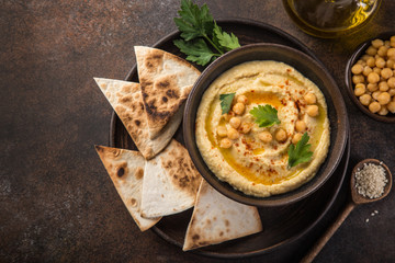  chickpeas hummus with olive oil and smoked paprika - obrazy, fototapety, plakaty