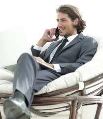 businessman solving business issues at home. blurred image