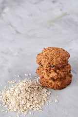 Sweet biscuits arranged in pattern on light textured background, close-up, shallow depth of field, selective focus.