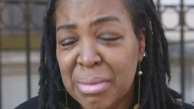 woman crying in the street