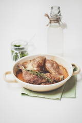 roast chicken with pesto on wooden background