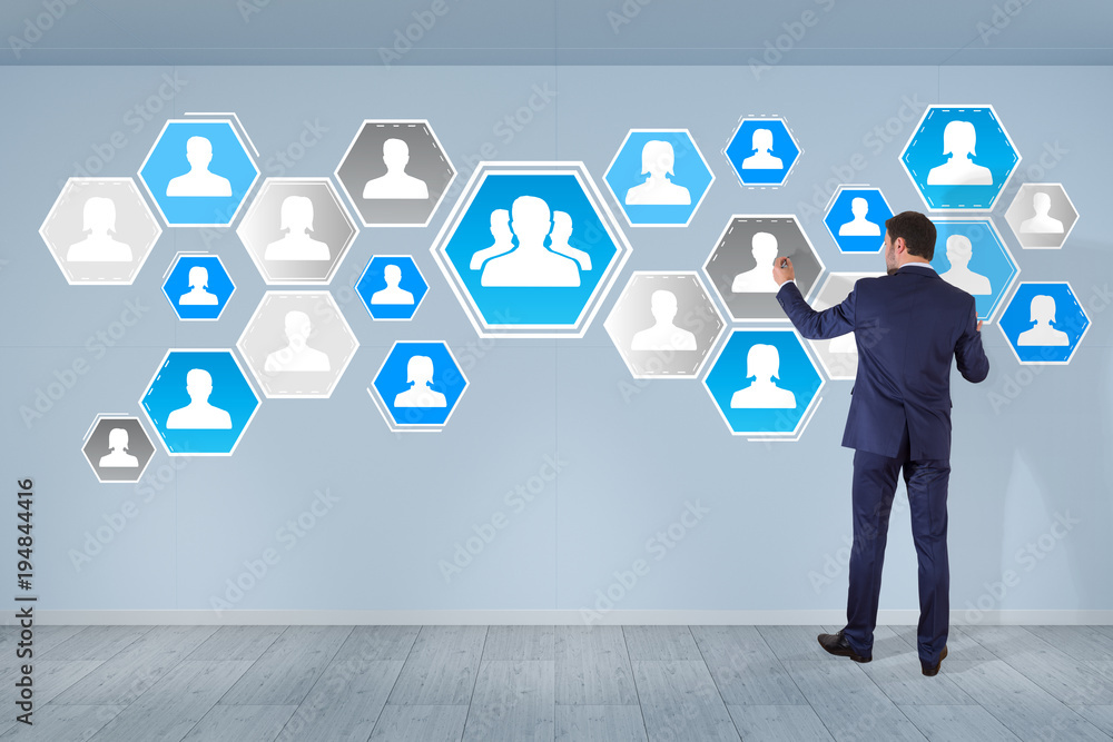 Aufkleber Businessman using social network interface on a wall 3D rendering