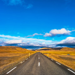 Fototapeta premium Isolated road and Icelandic colorful landscape at Iceland,