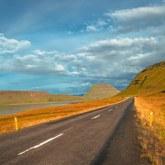 Isolated road and Icelandic colorful landscape at Iceland,