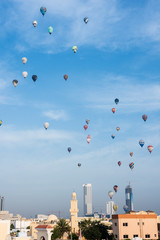 Fototapeta na wymiar Hot air balloons rising over Dubai
