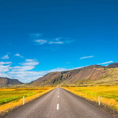 Isolated road and Icelandic colorful landscape at Iceland,