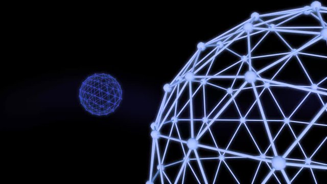 Two rotating wireframe spheres spinning and moving around