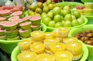 Different types of fruit in green pot