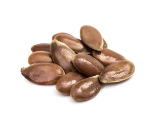 Close up of small pile of linseed or flax seed isolated on white background 