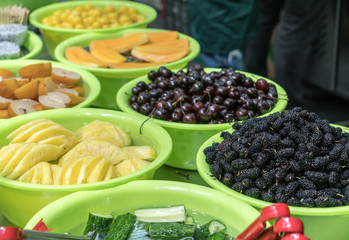 Different types of fruit in green pot