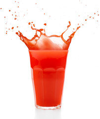 red juice splashing out of a glass isolated on white