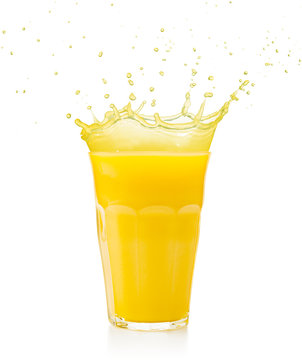 fruit juice glass splashing isolated on white