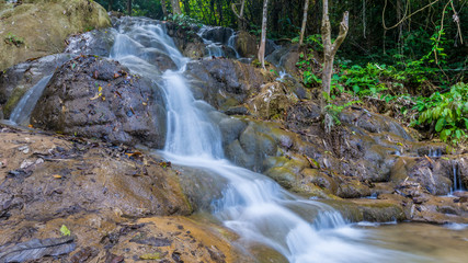 Obraz premium Pu Kang waterfall in the forest Chiang Rai province Thailand.