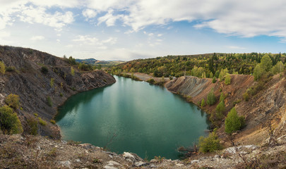 Blue lake in Altai. This is a former copper mine that was flooded with water