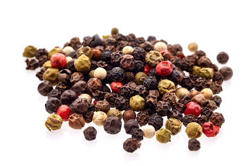 Seasoning - four kinds of pepper peas - isolated on white background