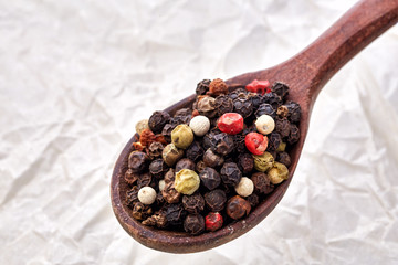 black pepper peas on a wooden spoon