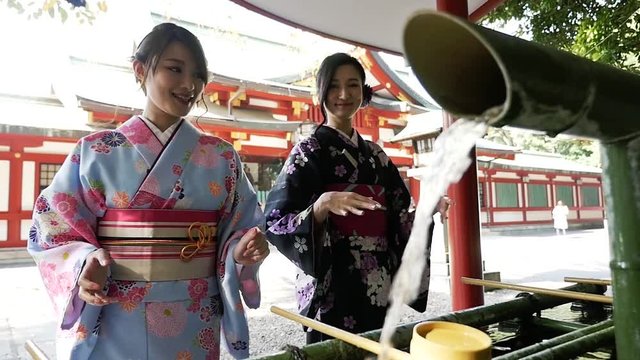Two japanese girl wearing traditional clothes in Tokyo