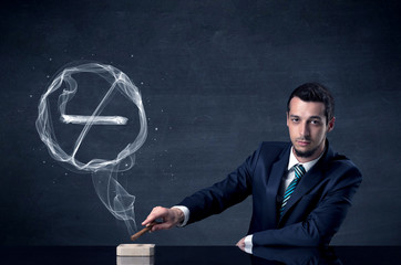 Businessman smoking cigarette.