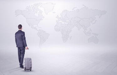 Businessman planning his trip over the world