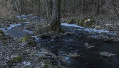 Milesovsky creek in Oparno valley in winter