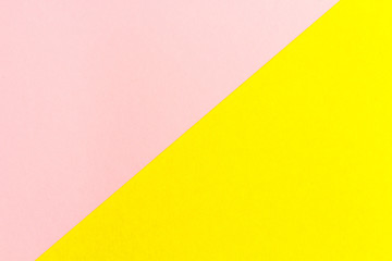 yellow and pink paper texture background Color. Trending colors, geometric background of the paper. Colorful soft paper background.Pastel color.