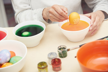 Woman preparing Easter eggs