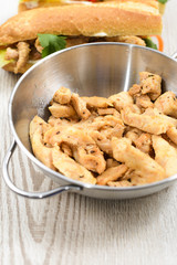 Roasted chicken meat in a pan.