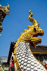 Fototapeta na wymiar dragon naga gold decoration Architecture in north Thailannd