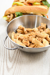 Roasted chicken meat in a pan.