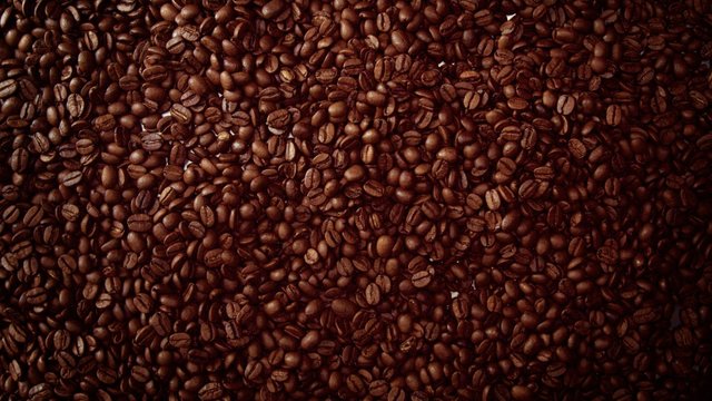 top view of coffe beans Background full of cofe beans studio shoot