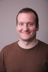 A young boy is laughing