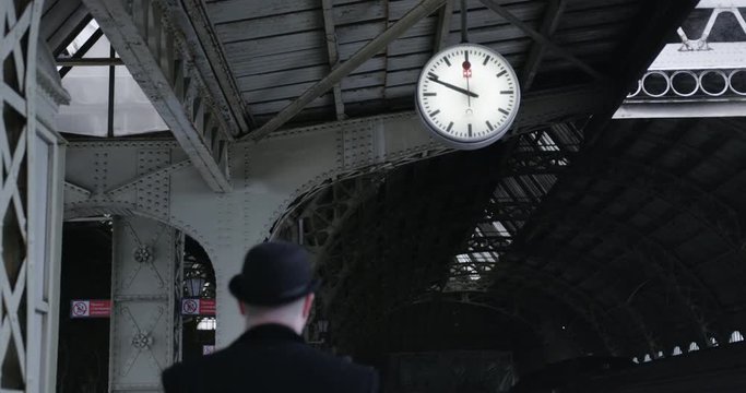 Man going in old station