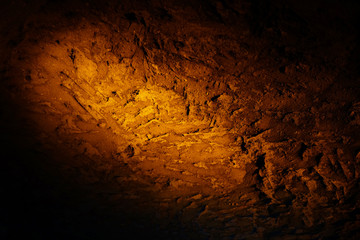 Natural texture created on the wall in the underground cave in Mazi underground city, Sehri,...
