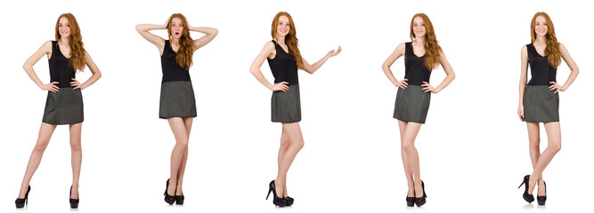 Red hair girl in gray dress isolated on white