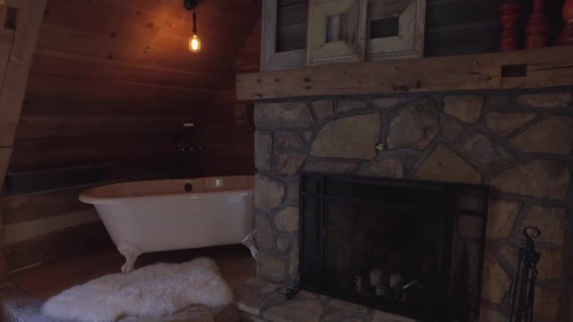 real estate bathtub beside fireplace honeymoon suite cottage 4k