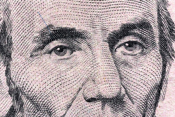 fragment of a banknote five American dollars