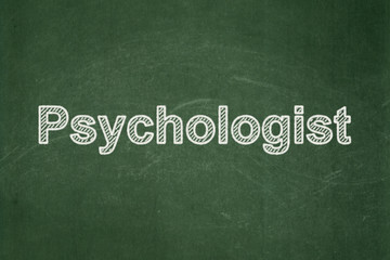 Fototapeta premium Healthcare concept: text Psychologist on Green chalkboard background